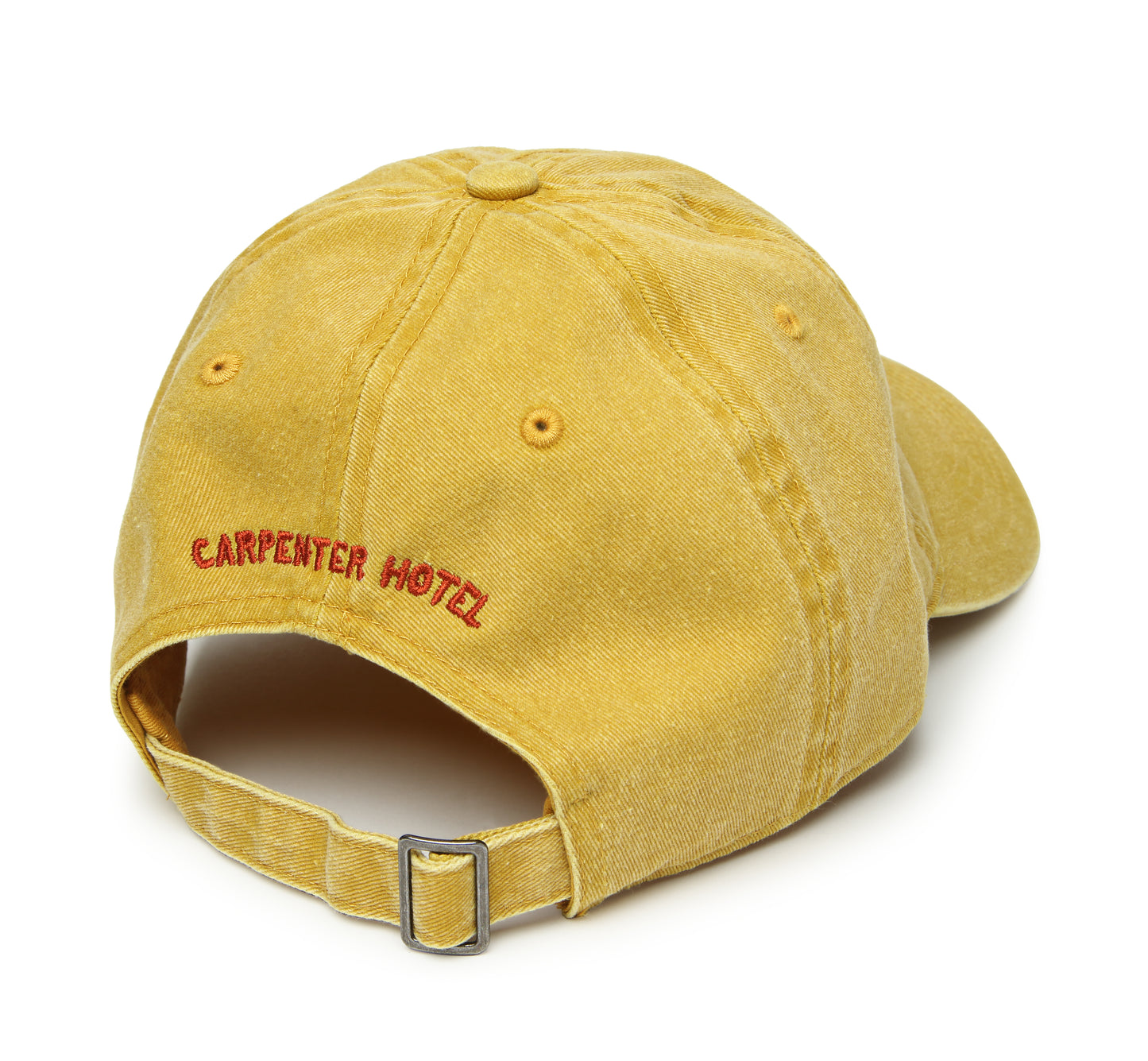 Back of yellow 'dad hat' says Carpenter Hotel in red embroidery
