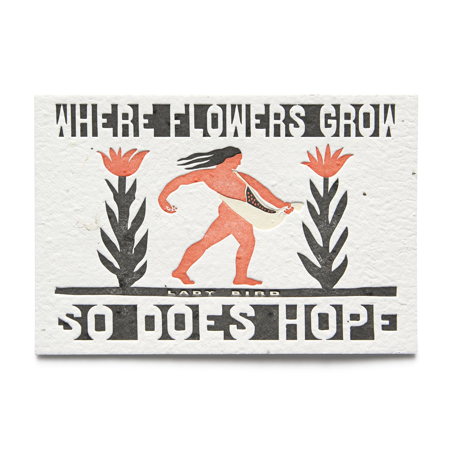 A postcard with letterpress text and illustration, featuring a figure sowing seeds among flowers, with the text 'WHERE FLOWERS GROW SO DOES HOPE - LADY BIRD'.
