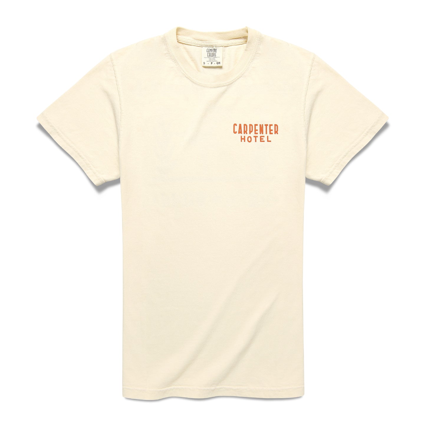 A beige Carpenter Hotel Tee with short sleeves and the logo 'CARPENTER HOTEL' printed on left side of the chest.