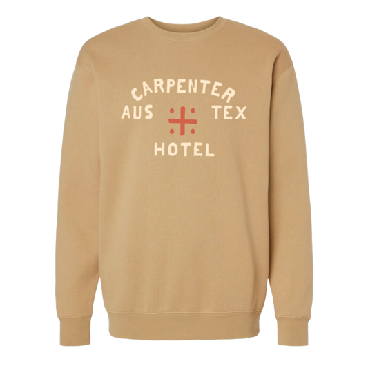 A beige crew neck sweatshirt with the Carpenter Hotel logo printed in the center.