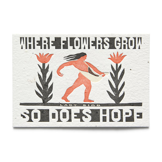 A postcard with letterpress text and illustration, featuring a figure sowing seeds among flowers, with the text 'WHERE FLOWERS GROW SO DOES HOPE - LADY BIRD'.